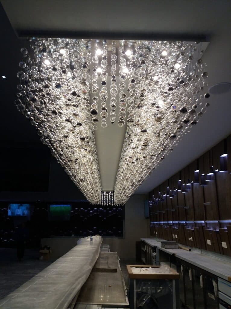 Contemporary crystal lighting by Magnolia Blossom Interiors