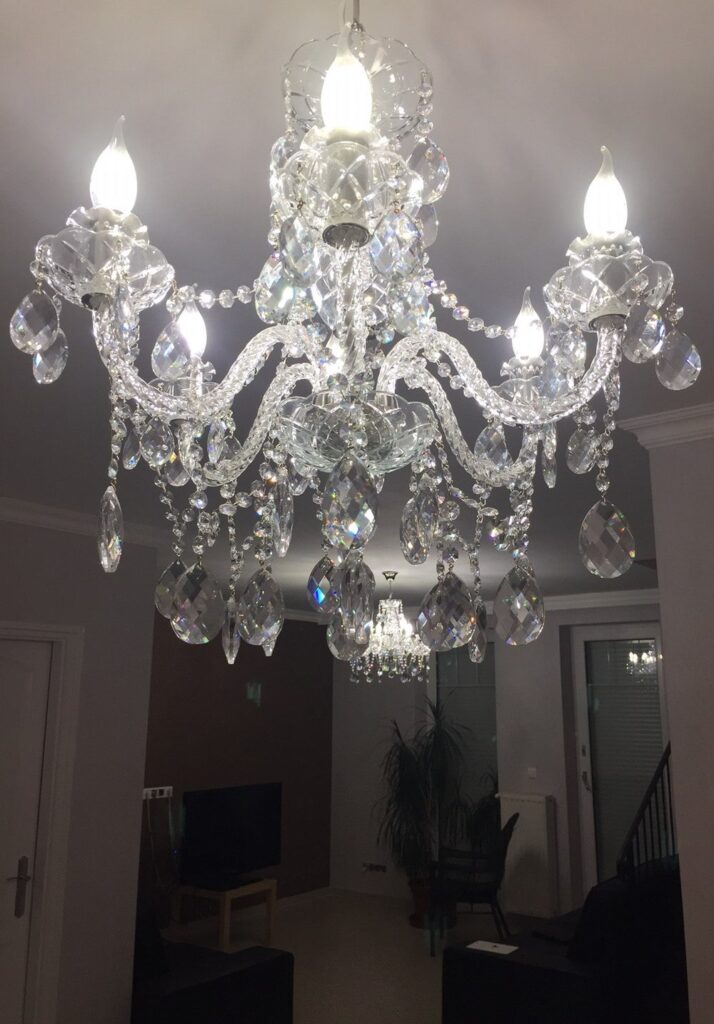 Luxury crystal chandelier by Magnolia Blossom Interiors