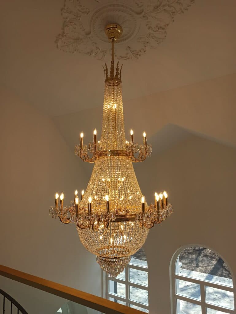 Luxury crystal chandelier by Magnolia Blossom Interiors