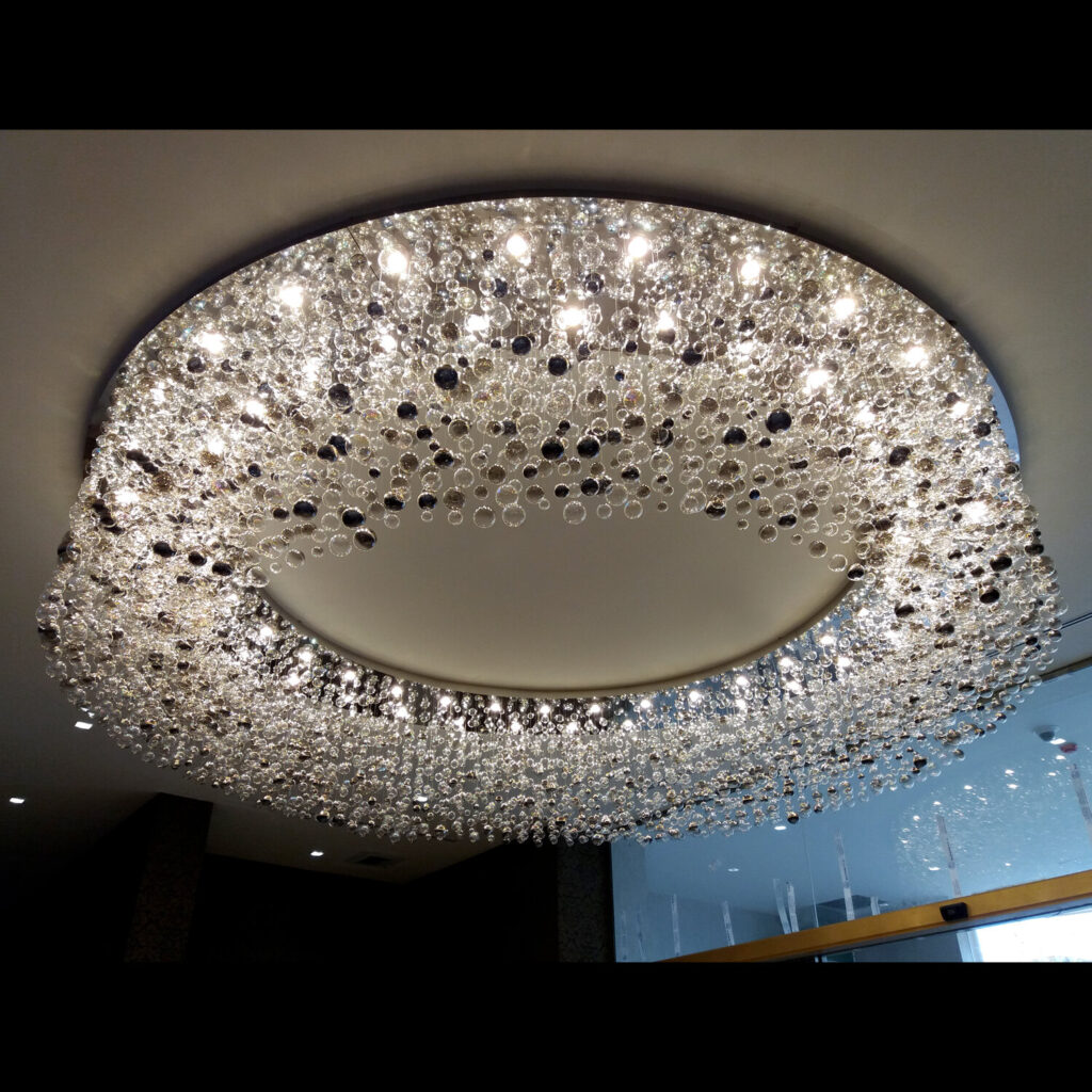 Elegant lighting centerpiece by Magnolia Blossom Interiors